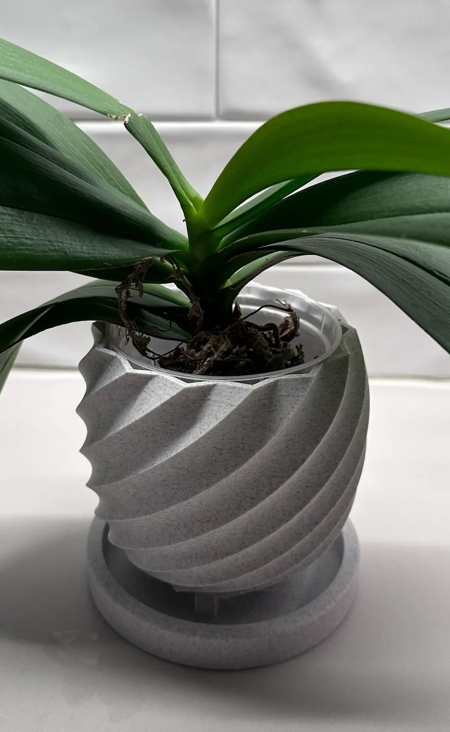 Spiral pot drip tray