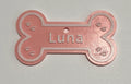 Personalized bone-shaped dog name tag