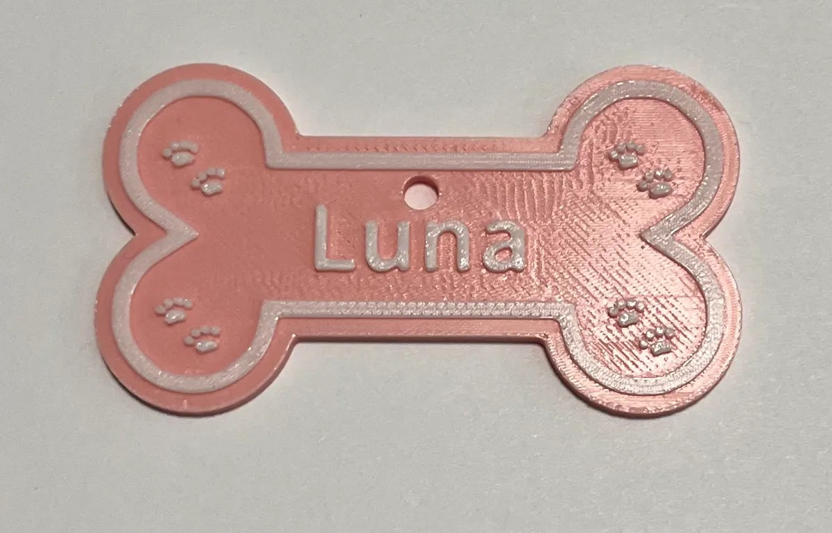 Personalized bone-shaped dog name tag