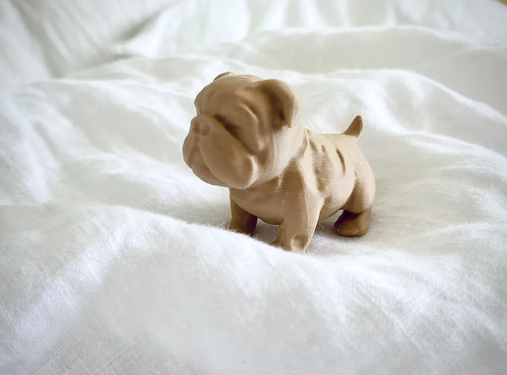 Chubby bulldog puppy figurine