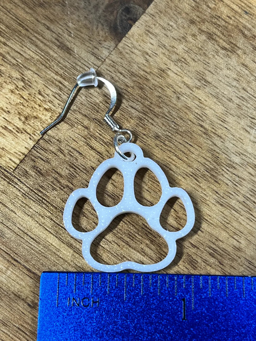 Paw print earrings close-up