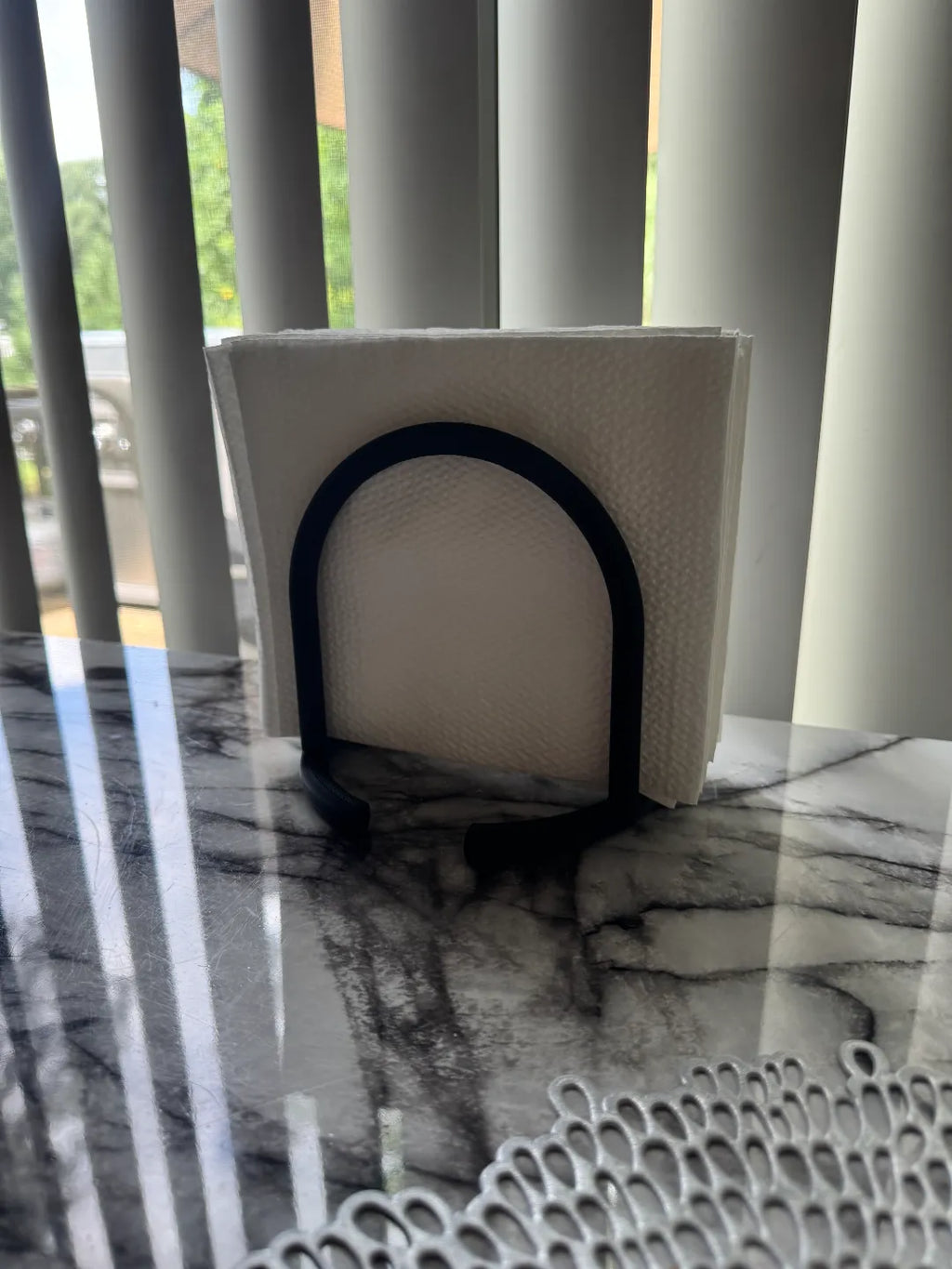 Napkin holder side view