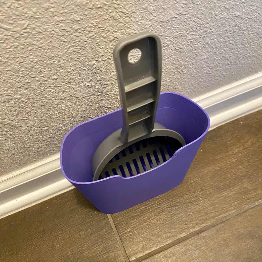 Litter scoop in holder