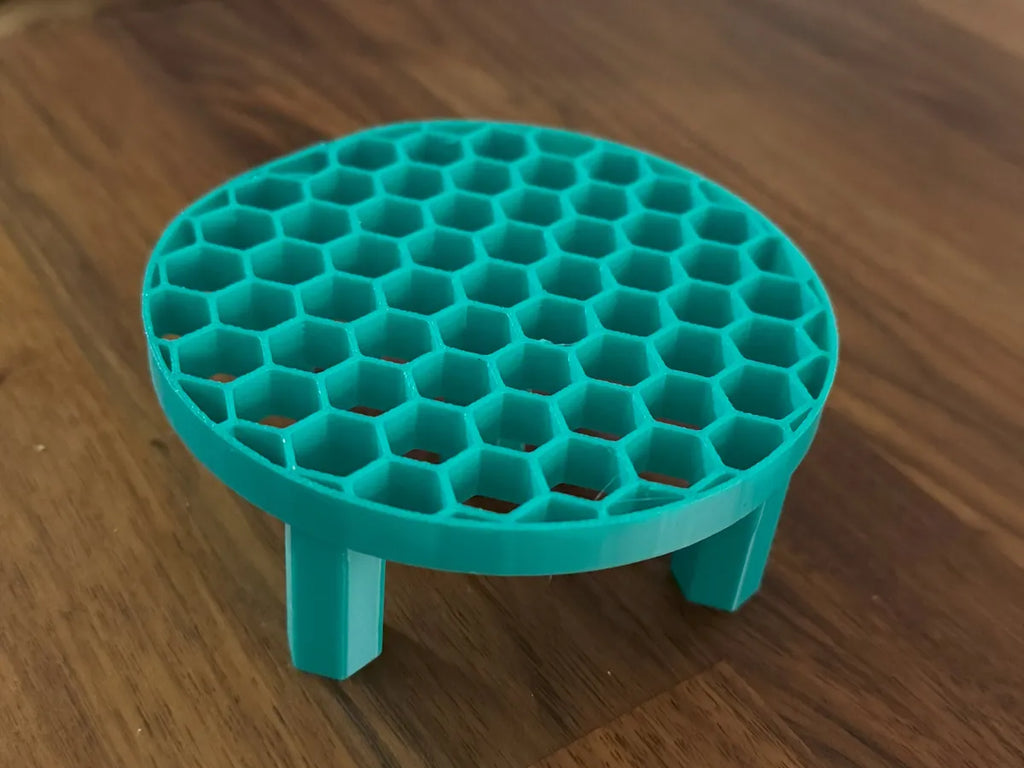Plant pot riser in a pot