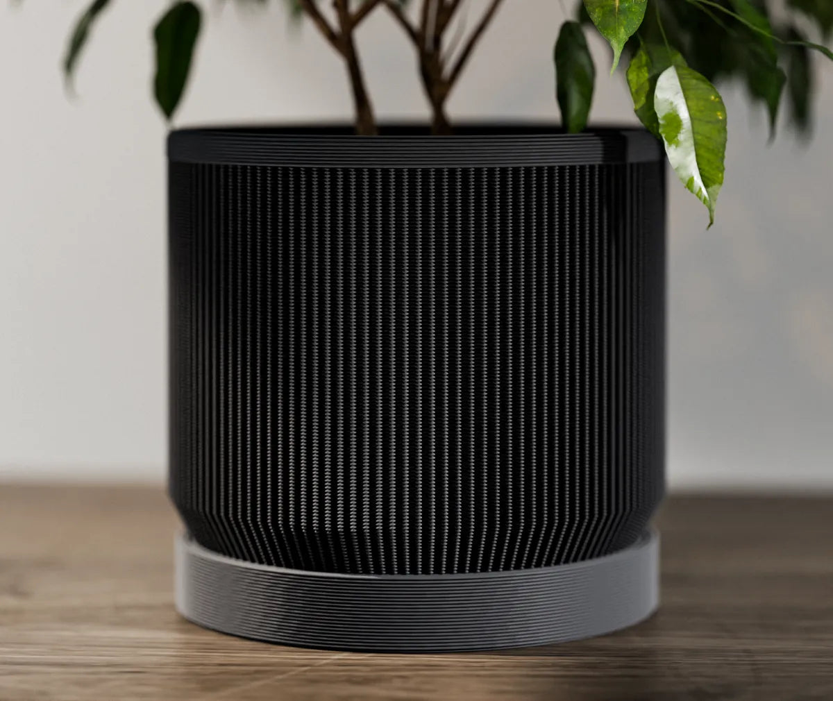 Ribbed planter with plant