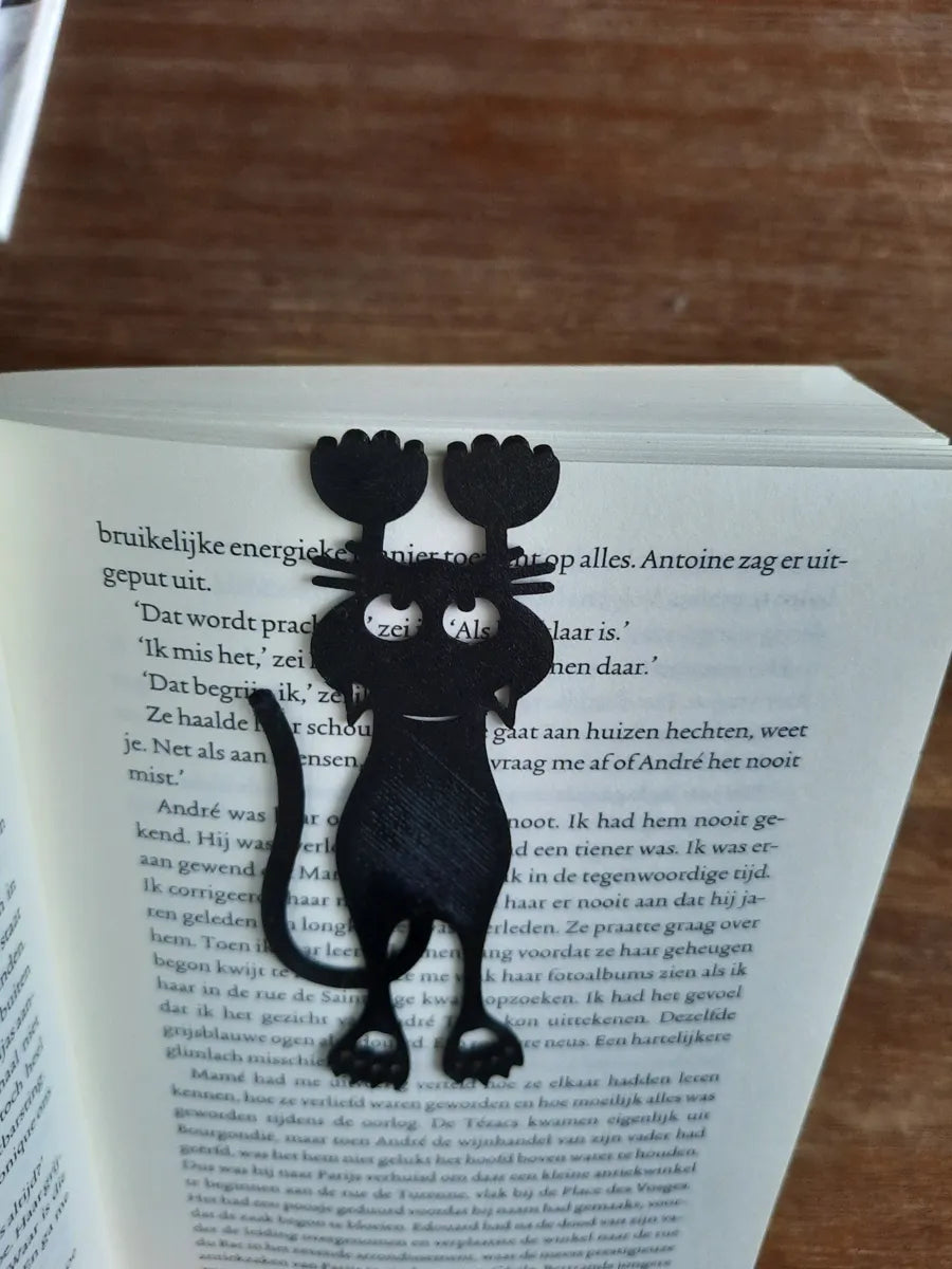 Hanging cat bookmark close-up