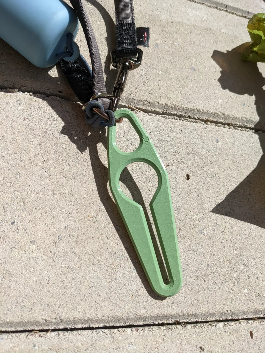 Poop bag holder on a leash