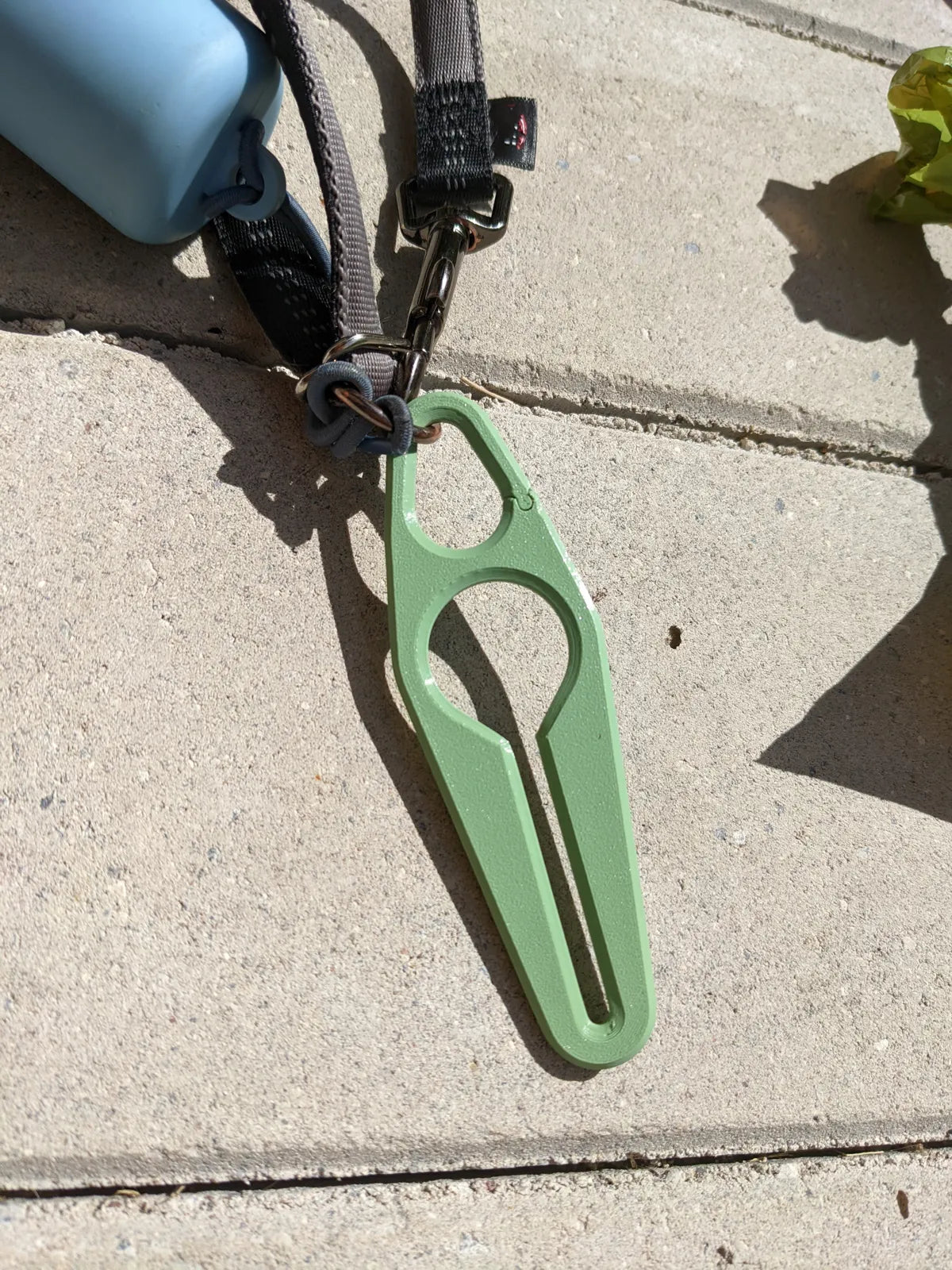 Poop bag holder on a leash