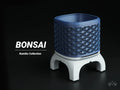 Kumiko bonsai planter with legs, designed by Meyui