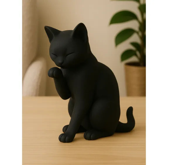 Black cat figurine design