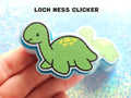 Loch Ness monster fidget clicker keychain